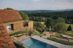 Am Wildbachberg - Luxus Ferienhäuser mit Infinitypool, Privatsauna und Weinkeller